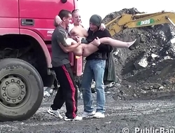 Young blonde cute girl public sex threesome at a construction site