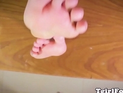 Toes wiggling tranny rubbing her soft soles